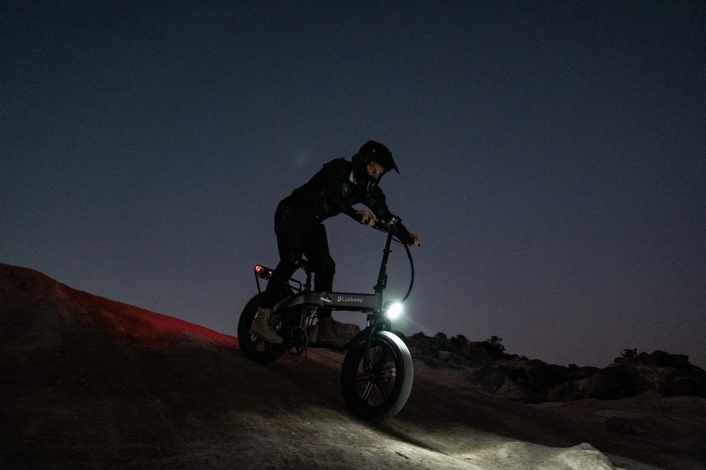 The X1 E-Bike by Luckeep  - Folding - 30 MPH - 20 x 4 Fat Tire Mountain or City E-Bike - Features front suspension, hydraulic disc brakes and turn signals for easier storage.