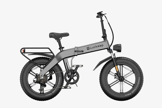 The X1 E-Bike by Luckeep  - Folding - 30 MPH - 20 x 4 Fat Tire Mountain or City E-Bike - Features front suspension, hydraulic disc brakes and turn signals for easier storage.